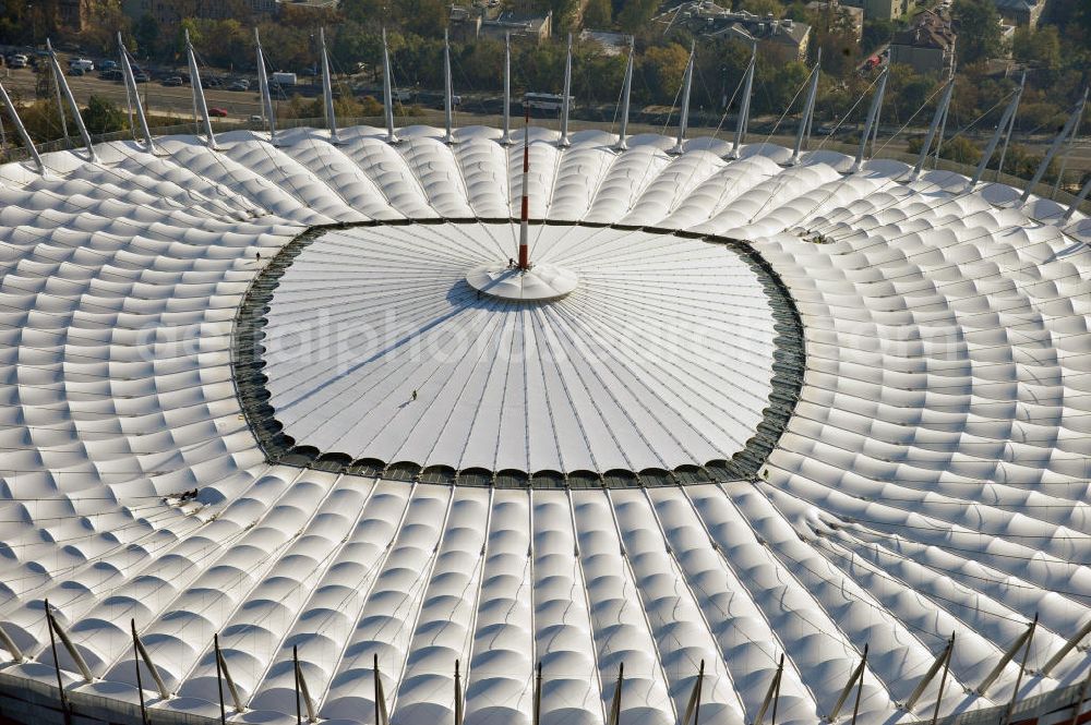 Aerial photograph Warschau / Warszawa / Warsaw - Das neu errichtete Stadion Warschauer Nationalstadion im Stadtteil Praga am Weichselufer gegenüber dem Warschauer Zentrum in der Woiwodschaft Masowien, Polen. Das Fußballstadion ist ein Austragungsort der UEFA Fußball-Europameisterschaft EM 2012. Generalplaner des Stadion-Neubau ist ein Konsortium aus den Architekturbüros JSK Architekten, Gerkan, Marg und Partner sowie dem Ingenieurbüro Schlaich Bergermann und Partner. Die Hochbauarbeiten wurden durch die ALPINE - PBG SA und die Hydrobudowa Polska SA ausgeführt. The new built stadium National Stadium in Warsaw in the voivodeship Masovia, Poland.