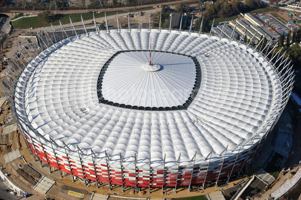 Aerial image Warschau / Warszawa / Warsaw - Das neu errichtete Stadion Warschauer Nationalstadion im Stadtteil Praga am Weichselufer gegenüber dem Warschauer Zentrum in der Woiwodschaft Masowien, Polen. Das Fußballstadion ist ein Austragungsort der UEFA Fußball-Europameisterschaft EM 2012. Generalplaner des Stadion-Neubau ist ein Konsortium aus den Architekturbüros JSK Architekten, Gerkan, Marg und Partner sowie dem Ingenieurbüro Schlaich Bergermann und Partner. Die Hochbauarbeiten wurden durch die ALPINE - PBG SA und die Hydrobudowa Polska SA ausgeführt. The new built stadium National Stadium in Warsaw in the voivodeship Masovia, Poland.