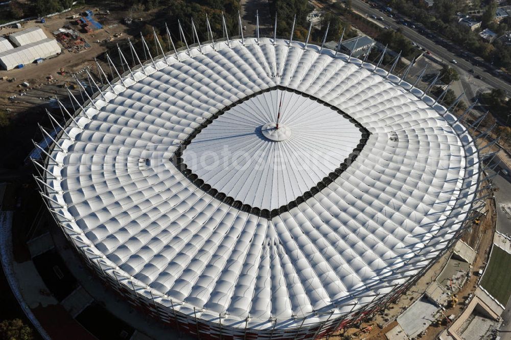 Aerial image Warschau / Warszawa / Warsaw - Das neu errichtete Stadion Warschauer Nationalstadion im Stadtteil Praga am Weichselufer gegenüber dem Warschauer Zentrum in der Woiwodschaft Masowien, Polen. Das Fußballstadion ist ein Austragungsort der UEFA Fußball-Europameisterschaft EM 2012. Generalplaner des Stadion-Neubau ist ein Konsortium aus den Architekturbüros JSK Architekten, Gerkan, Marg und Partner sowie dem Ingenieurbüro Schlaich Bergermann und Partner. Die Hochbauarbeiten wurden durch die ALPINE - PBG SA und die Hydrobudowa Polska SA ausgeführt. The new built stadium National Stadium in Warsaw in the voivodeship Masovia, Poland.