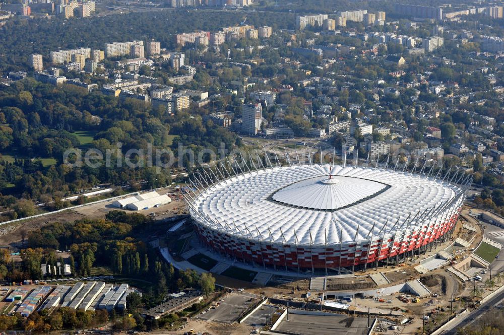 Aerial image Warschau / Warszawa / Warsaw - Das neu errichtete Stadion Warschauer Nationalstadion im Stadtteil Praga am Weichselufer gegenüber dem Warschauer Zentrum in der Woiwodschaft Masowien, Polen. Das Fußballstadion ist ein Austragungsort der UEFA Fußball-Europameisterschaft EM 2012. Generalplaner des Stadion-Neubau ist ein Konsortium aus den Architekturbüros JSK Architekten, Gerkan, Marg und Partner sowie dem Ingenieurbüro Schlaich Bergermann und Partner. Die Hochbauarbeiten wurden durch die ALPINE - PBG SA und die Hydrobudowa Polska SA ausgeführt. The new built stadium National Stadium in Warsaw in the voivodeship Masovia, Poland.