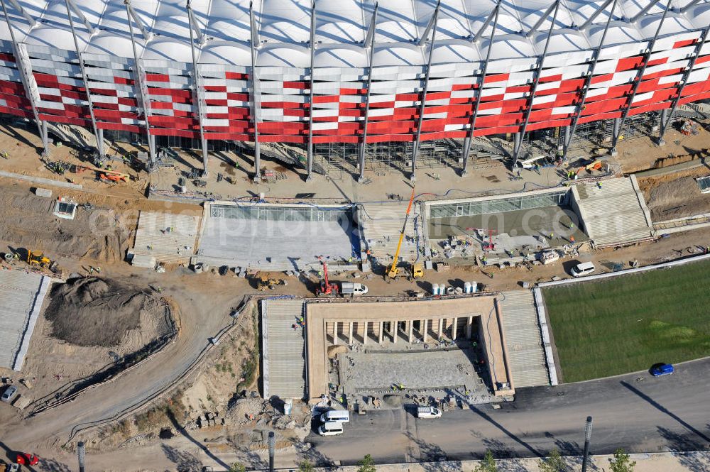 Aerial image Warschau / Warszawa / Warsaw - Das neu errichtete Stadion Warschauer Nationalstadion im Stadtteil Praga am Weichselufer gegenüber dem Warschauer Zentrum in der Woiwodschaft Masowien, Polen. Das Fußballstadion ist ein Austragungsort der UEFA Fußball-Europameisterschaft EM 2012. Generalplaner des Stadion-Neubau ist ein Konsortium aus den Architekturbüros JSK Architekten, Gerkan, Marg und Partner sowie dem Ingenieurbüro Schlaich Bergermann und Partner. Die Hochbauarbeiten wurden durch die ALPINE - PBG SA und die Hydrobudowa Polska SA ausgeführt. The new built stadium National Stadium in Warsaw in the voivodeship Masovia, Poland.