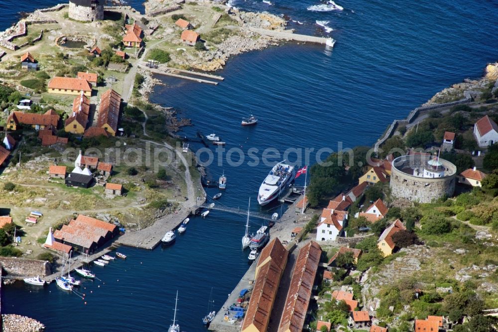 Aerial image Christianso - Natural harbor between the two main inhabited islands of the archipelago of islands peas ( Ertholmene) in Denmark