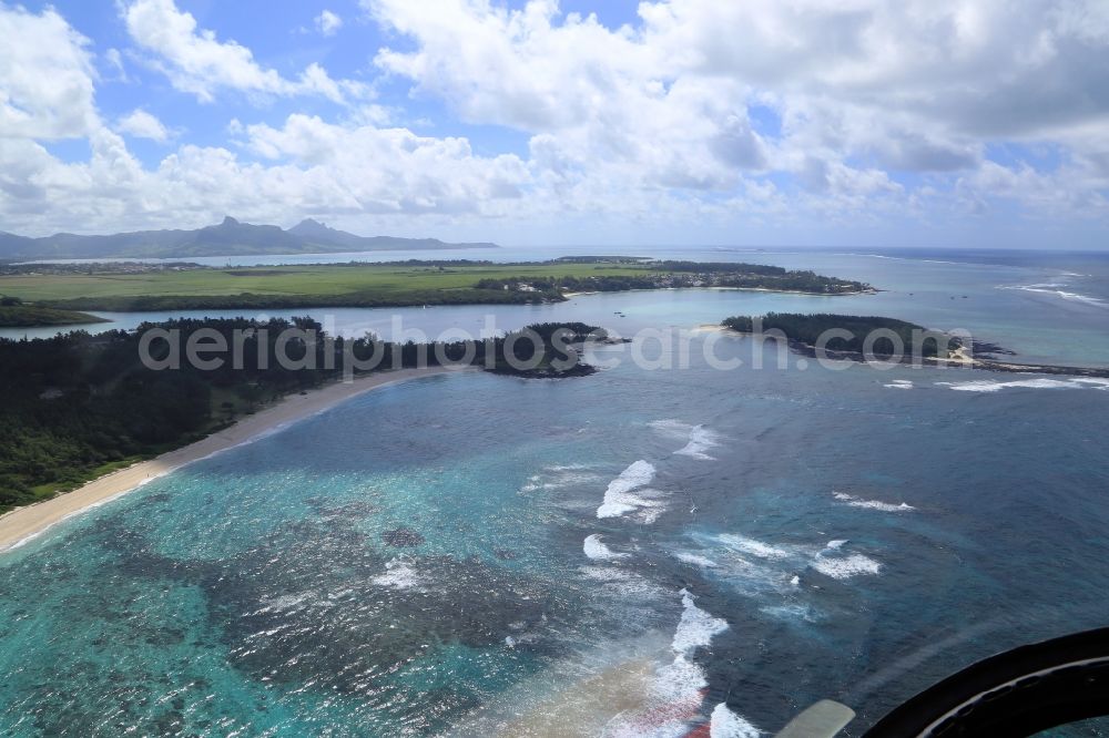 Aerial image Blue Bay - Beach, lagoon and coral reef at the nature reserve Blue Bay on the island Mauritius in the Indian Ocean