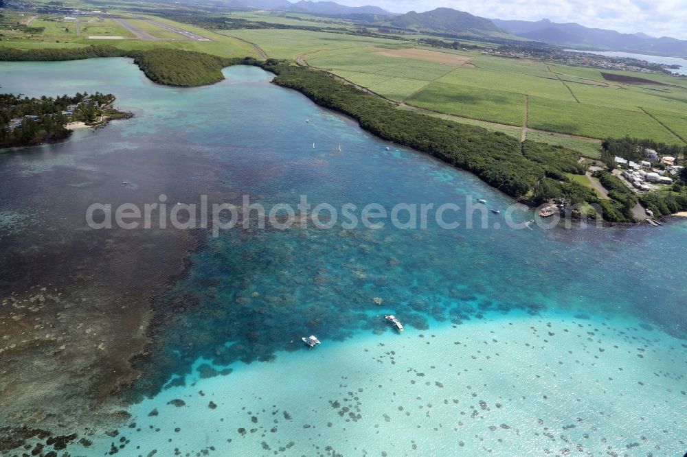 Aerial photograph Blue Bay - Beach, lagoon and coral reef at the nature reserve Blue Bay on the island Mauritius in the Indian Ocean