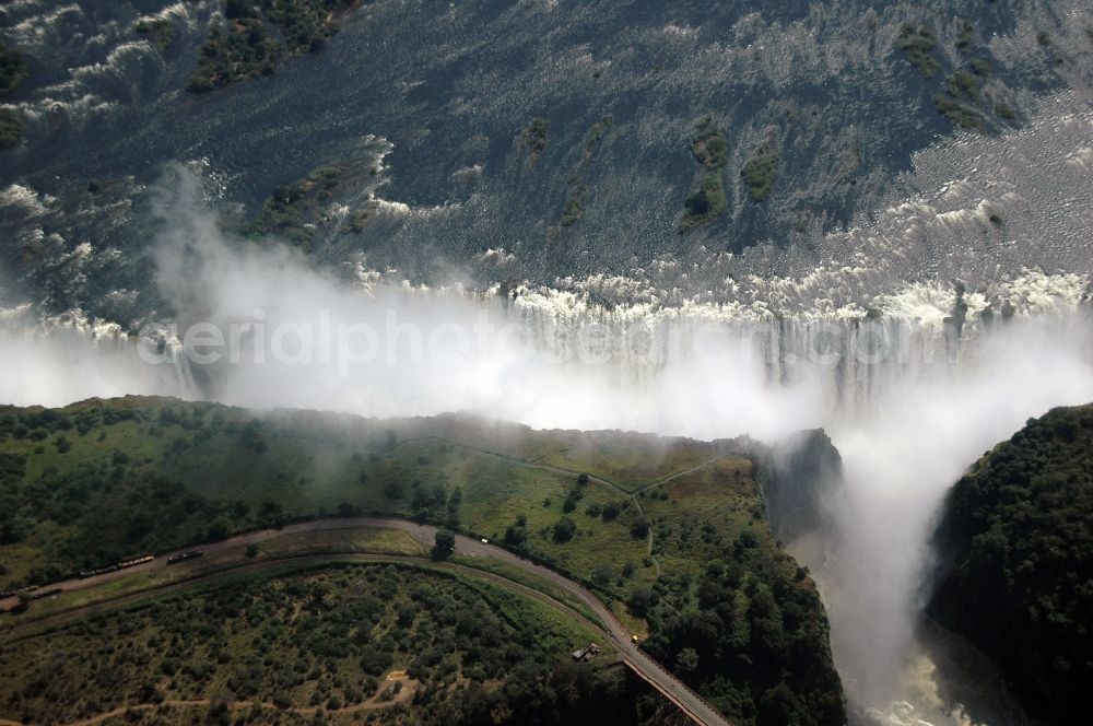 Victoria Falls from above - Natural spectacle of the waterfall in the rocky landscape on sambesi river in Victoria Falls in Matabeleland North Province, Zimbabwe