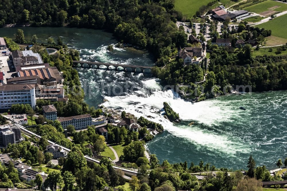 Neuhausen am Rheinfall from above - Natural spectacle of the waterfall in the rocky landscape Rheinfall in Neuhausen am Rheinfall in the canton Schaffhausen, Switzerland