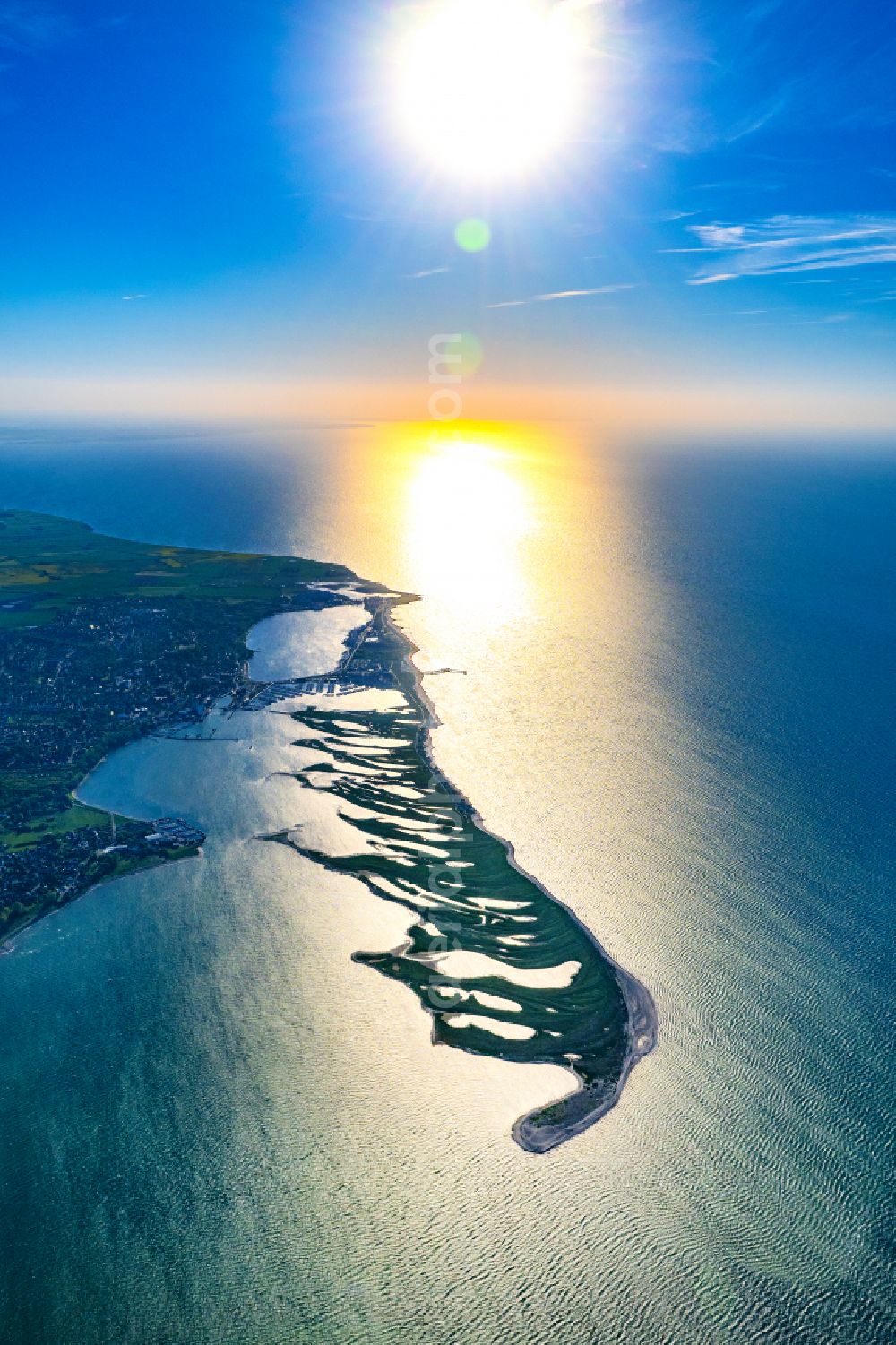 Aerial image Heiligenhafen - Sandy beach landscape along the coastline on the shore of the Baltic Sea with houses and buildings of the Nature Reserve & NABU Center Graswarder on the street Graswarderweg in the district of Graswarder in Heiligenhafen on the Baltic Sea coast in the federal state of Schleswig-Holstein, Germany