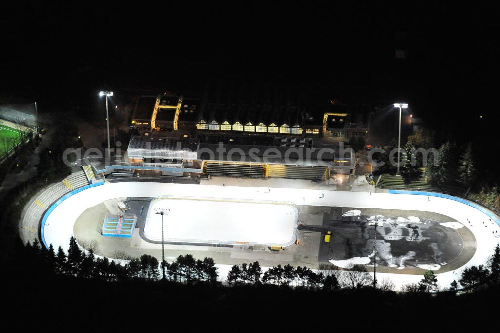 Aerial photograph Berlin - Nachtluftbild der Beleutung der Eislaufbahn des Horst-Dohm-Eisstadion, an der Fritz-Wildung-Str. 9 in 14199 Berlin-Wilmersdorf. Night shot of Ice skating rink at 14199 Berlin-Wilmersdorf.