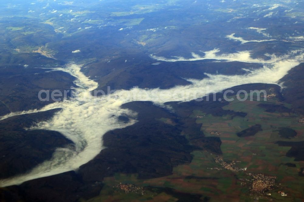 Lohr am Main from the bird's eye view: Autumn mood with fog in the valley of the Main in Lohr am Main in the state Bavaria