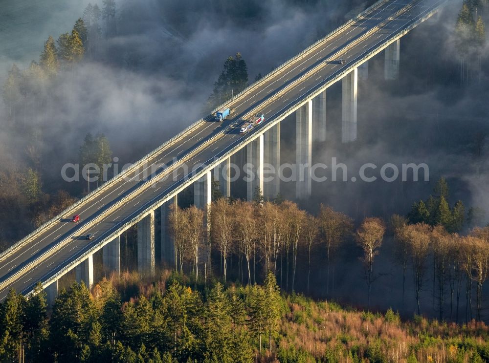 Aerial image Arnsberg OT Oeventrop - Fog surrounded motorway bridge on the motorway Autobahn A46 at Oeventrop - a district of Arnsberg in the Sauerland region in North Rhine-Westphalia