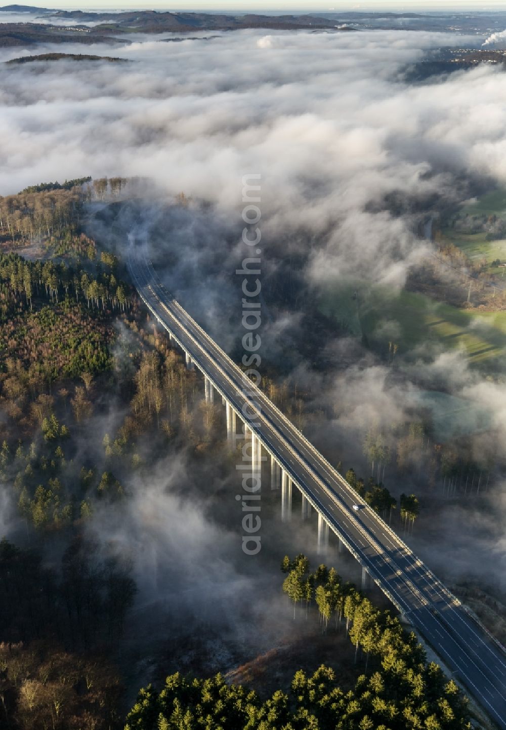 Aerial image Arnsberg OT Oeventrop - Fog surrounded motorway bridge on the motorway Autobahn A46 at Oeventrop - a district of Arnsberg in the Sauerland region in North Rhine-Westphalia