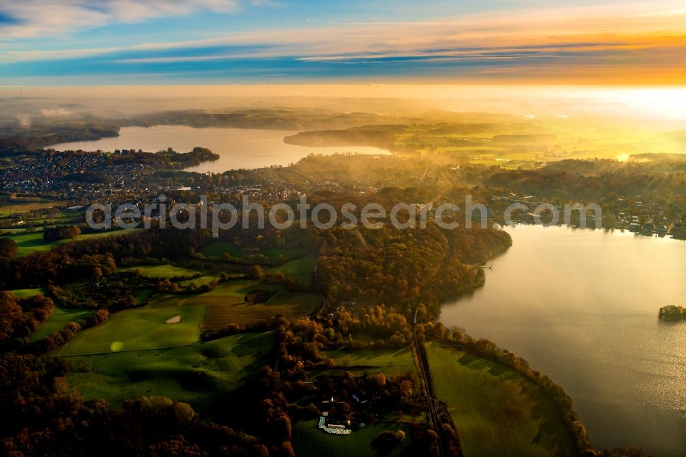 Aerial photograph Malente - Weather related fog banks and cloud layer in Sonnenaufgang in Malente in the Holsteinische Schweiz in the state Schleswig-Holstein, Germany