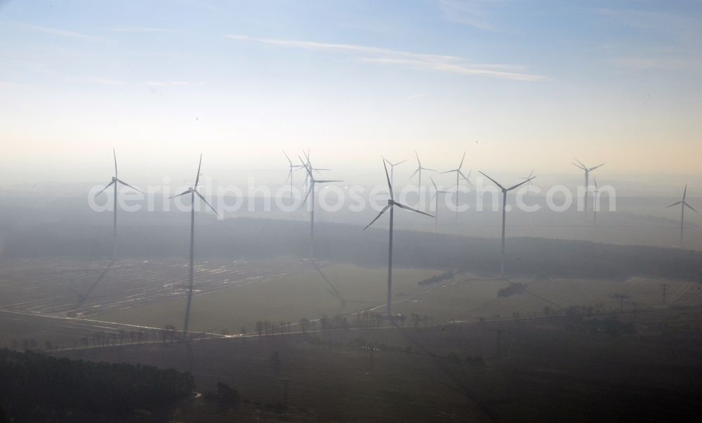 Werneuchen from the bird's eye view: Fog landscape with rotors of wind turbines of a wind power plant in Werneuchen in Brandenburg