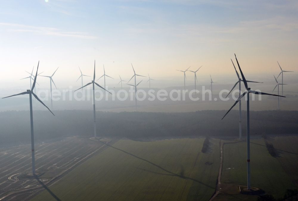 Werneuchen from above - Fog landscape with rotors of wind turbines of a wind power plant in Werneuchen in Brandenburg