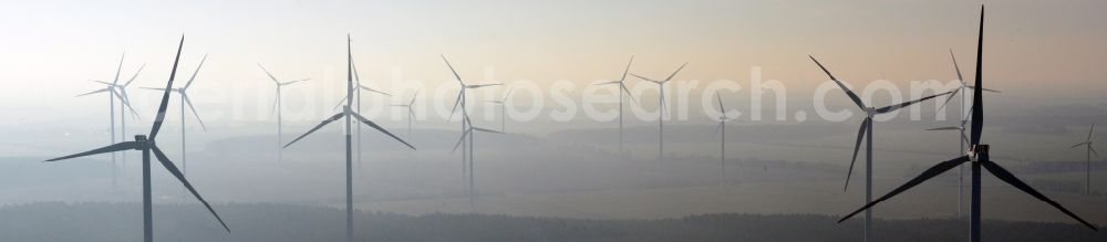 Werneuchen from the bird's eye view: Fog landscape with rotors of wind turbines of a wind power plant in Werneuchen in Brandenburg