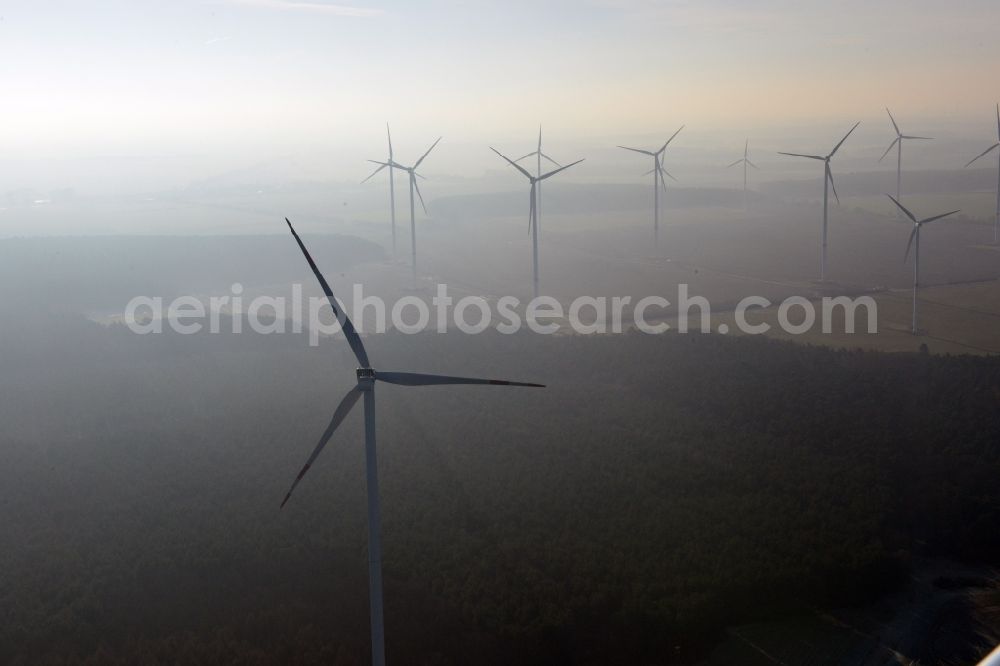 Werneuchen from the bird's eye view: Fog landscape with rotors of wind turbines of a wind power plant in Werneuchen in Brandenburg