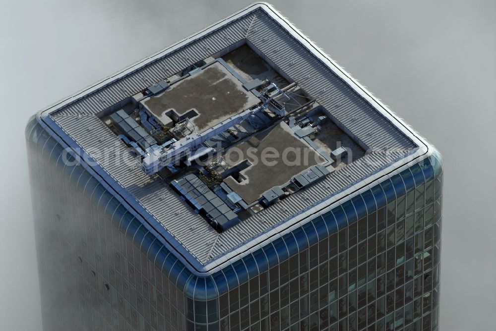 Aerial image München - Outstanding from a layer of fog and high fog, the Uptown high-rise building - headquarters of Telefonica Germany (O2) and Astellas Pharma GmbH on Georg-Brauchle-Ring in the Moosach district of Munich in the state of Bavaria