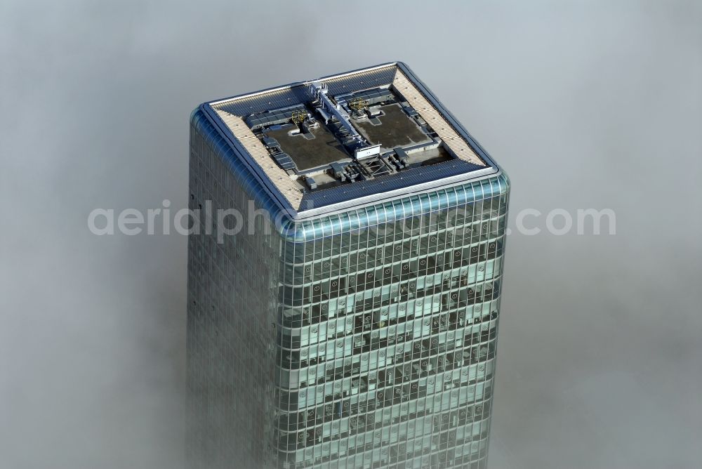 Aerial photograph München - Outstanding from a layer of fog and high fog, the Uptown high-rise building - headquarters of Telefonica Germany (O2) and Astellas Pharma GmbH on Georg-Brauchle-Ring in the Moosach district of Munich in the state of Bavaria