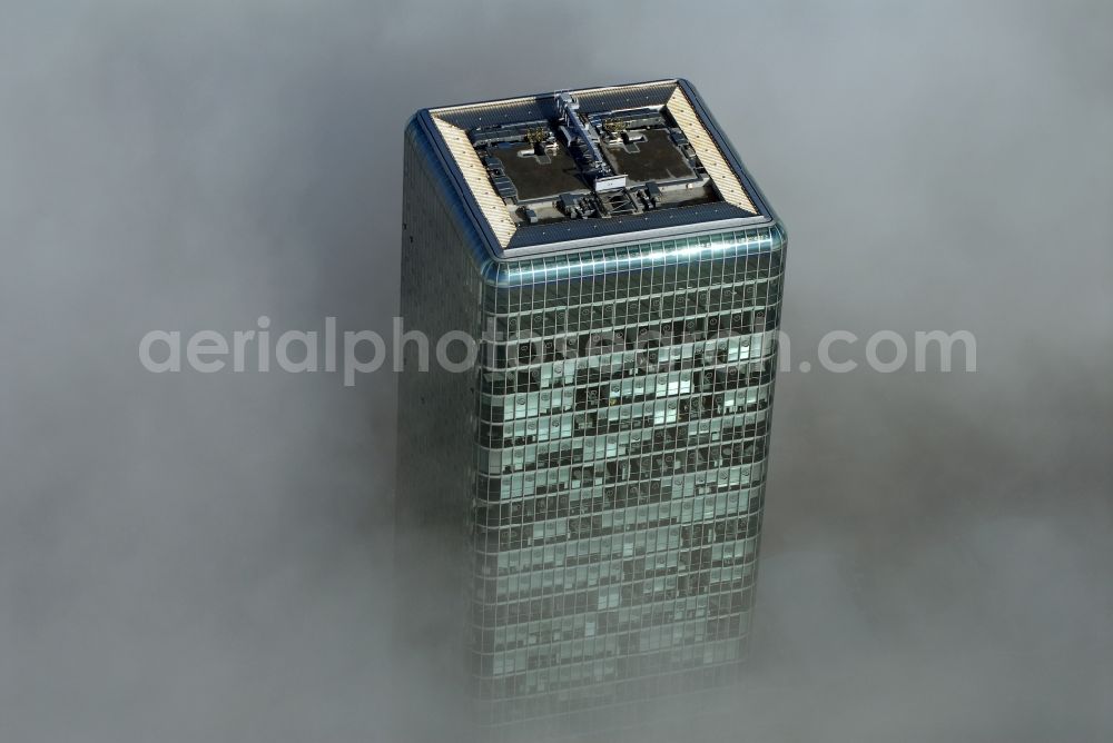 München from above - Outstanding from a layer of fog and high fog, the Uptown high-rise building - headquarters of Telefonica Germany (O2) and Astellas Pharma GmbH on Georg-Brauchle-Ring in the Moosach district of Munich in the state of Bavaria