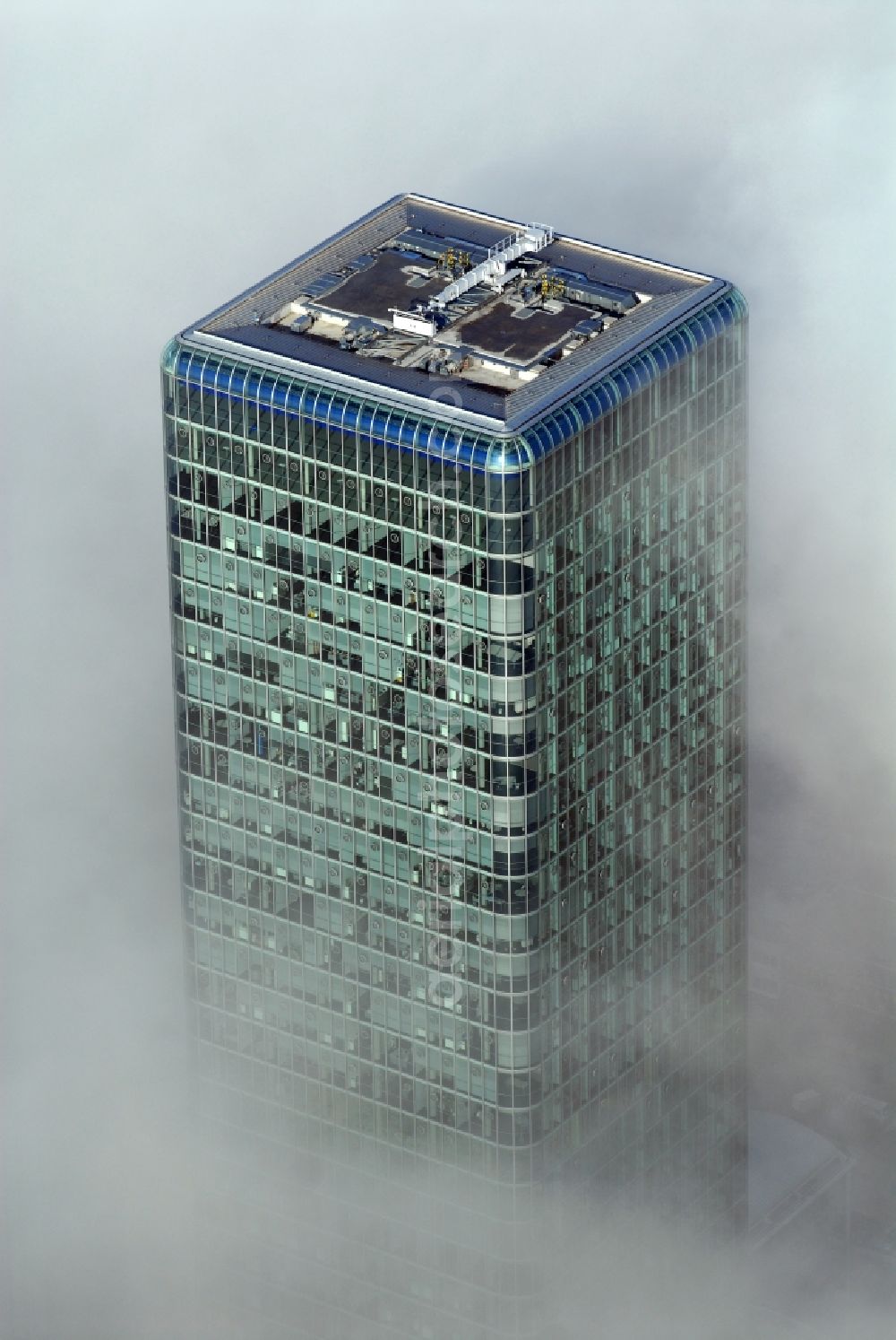 Aerial image München - Outstanding from a layer of fog and high fog, the Uptown high-rise building - headquarters of Telefonica Germany (O2) and Astellas Pharma GmbH on Georg-Brauchle-Ring in the Moosach district of Munich in the state of Bavaria