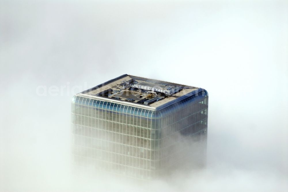 Aerial photograph München - Outstanding from a layer of fog and high fog, the Uptown high-rise building - headquarters of Telefonica Germany (O2) and Astellas Pharma GmbH on Georg-Brauchle-Ring in the Moosach district of Munich in the state of Bavaria