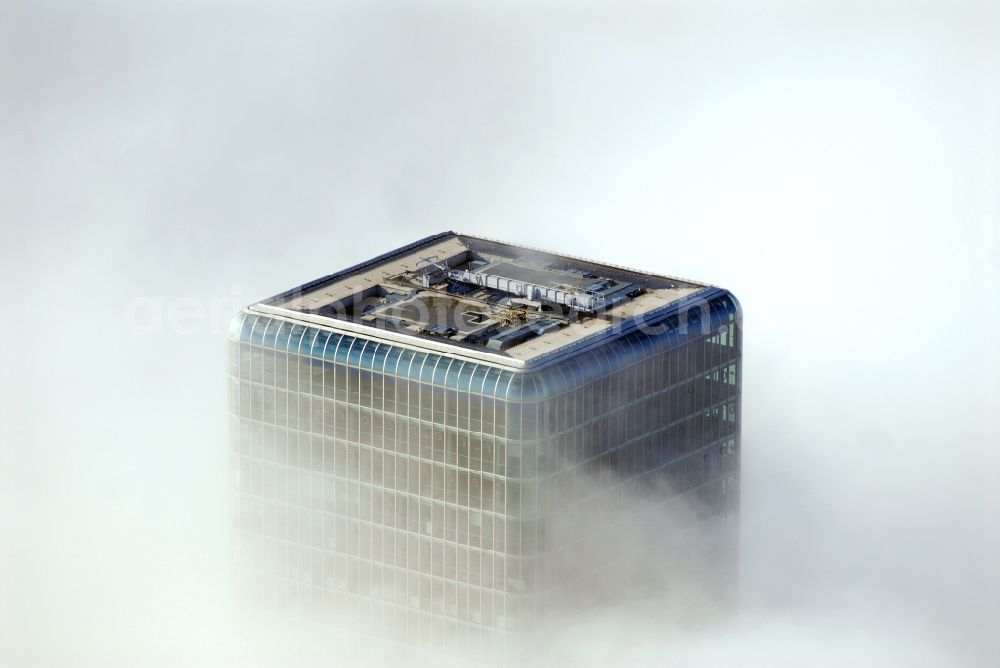 München from above - Outstanding from a layer of fog and high fog, the Uptown high-rise building - headquarters of Telefonica Germany (O2) and Astellas Pharma GmbH on Georg-Brauchle-Ring in the Moosach district of Munich in the state of Bavaria