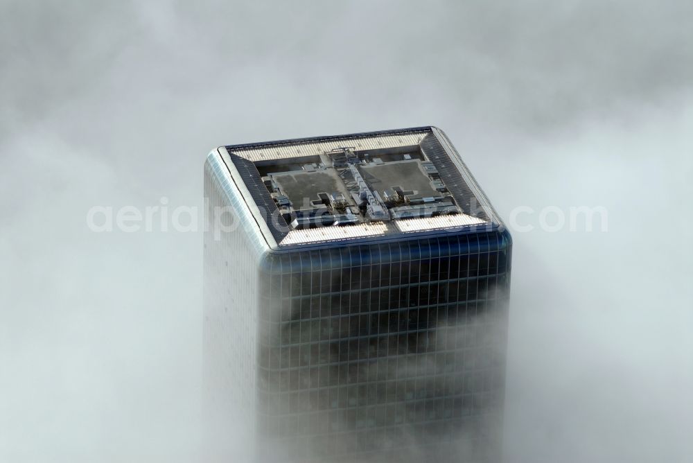 Aerial image München - Outstanding from a layer of fog and high fog, the Uptown high-rise building - headquarters of Telefonica Germany (O2) and Astellas Pharma GmbH on Georg-Brauchle-Ring in the Moosach district of Munich in the state of Bavaria