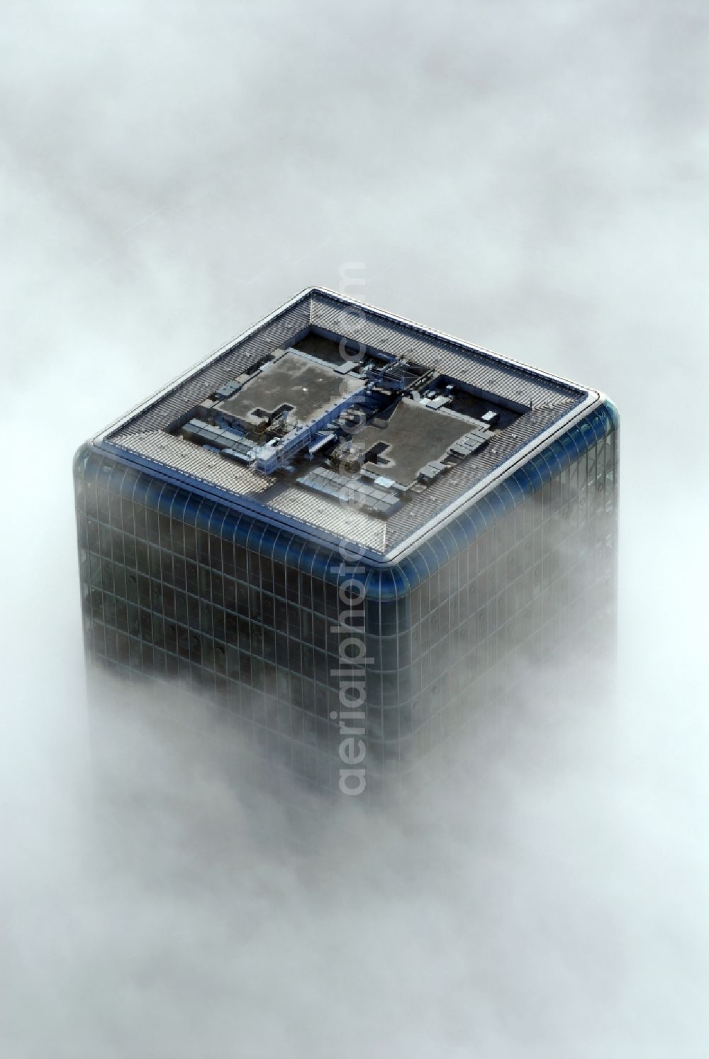 Aerial photograph München - Outstanding from a layer of fog and high fog, the Uptown high-rise building - headquarters of Telefonica Germany (O2) and Astellas Pharma GmbH on Georg-Brauchle-Ring in the Moosach district of Munich in the state of Bavaria