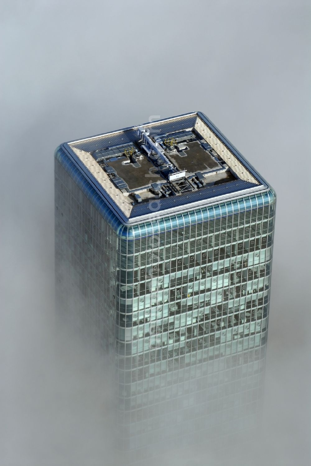 Aerial image München - Outstanding from a layer of fog and high fog, the Uptown high-rise building - headquarters of Telefonica Germany (O2) and Astellas Pharma GmbH on Georg-Brauchle-Ring in the Moosach district of Munich in the state of Bavaria