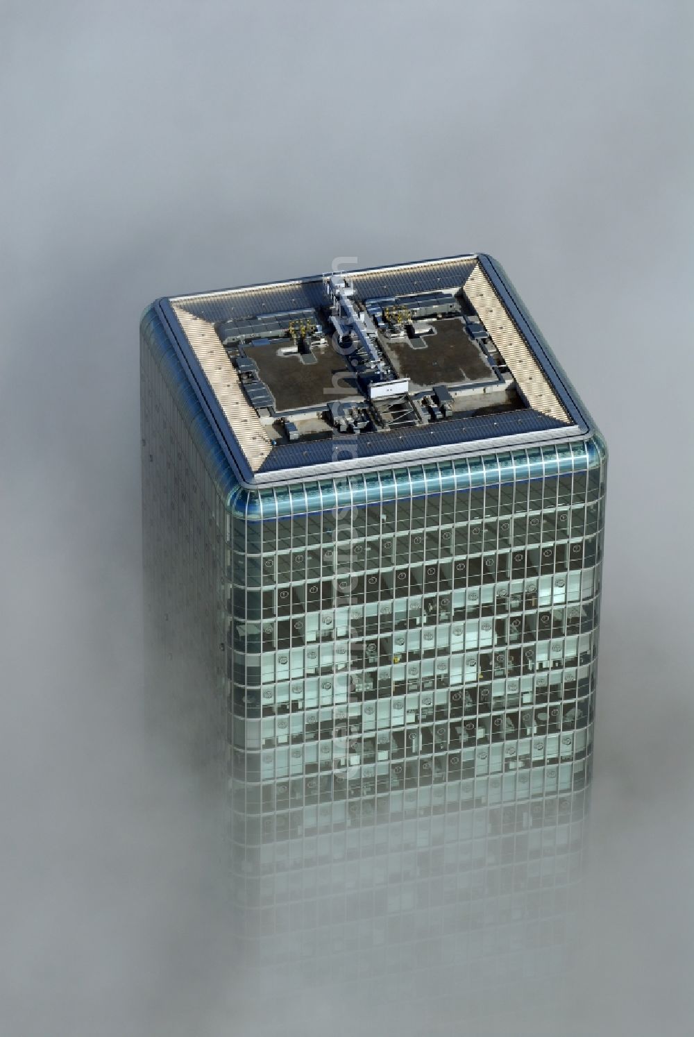 Aerial photograph München - Outstanding from a layer of fog and high fog, the Uptown high-rise building - headquarters of Telefonica Germany (O2) and Astellas Pharma GmbH on Georg-Brauchle-Ring in the Moosach district of Munich in the state of Bavaria