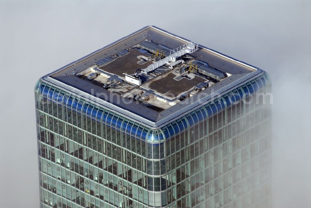 München from the bird's eye view: Outstanding from a layer of fog and high fog, the Uptown high-rise building - headquarters of Telefonica Germany (O2) and Astellas Pharma GmbH on Georg-Brauchle-Ring in the Moosach district of Munich in the state of Bavaria