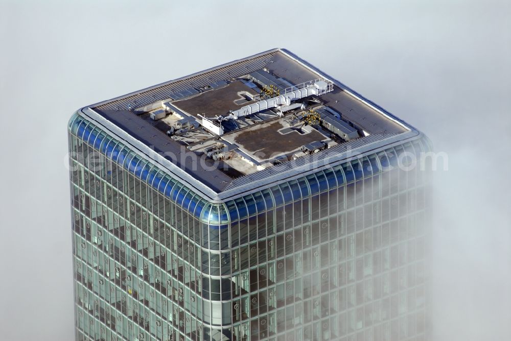 Aerial image München - Outstanding from a layer of fog and high fog, the Uptown high-rise building - headquarters of Telefonica Germany (O2) and Astellas Pharma GmbH on Georg-Brauchle-Ring in the Moosach district of Munich in the state of Bavaria