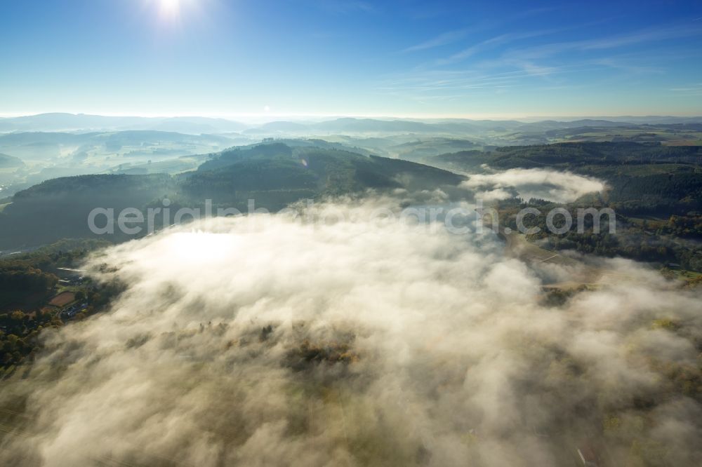 Meschede from above - Fog hanger riparian areas on the lake area of Hennesee in Meschede in the state North Rhine-Westphalia