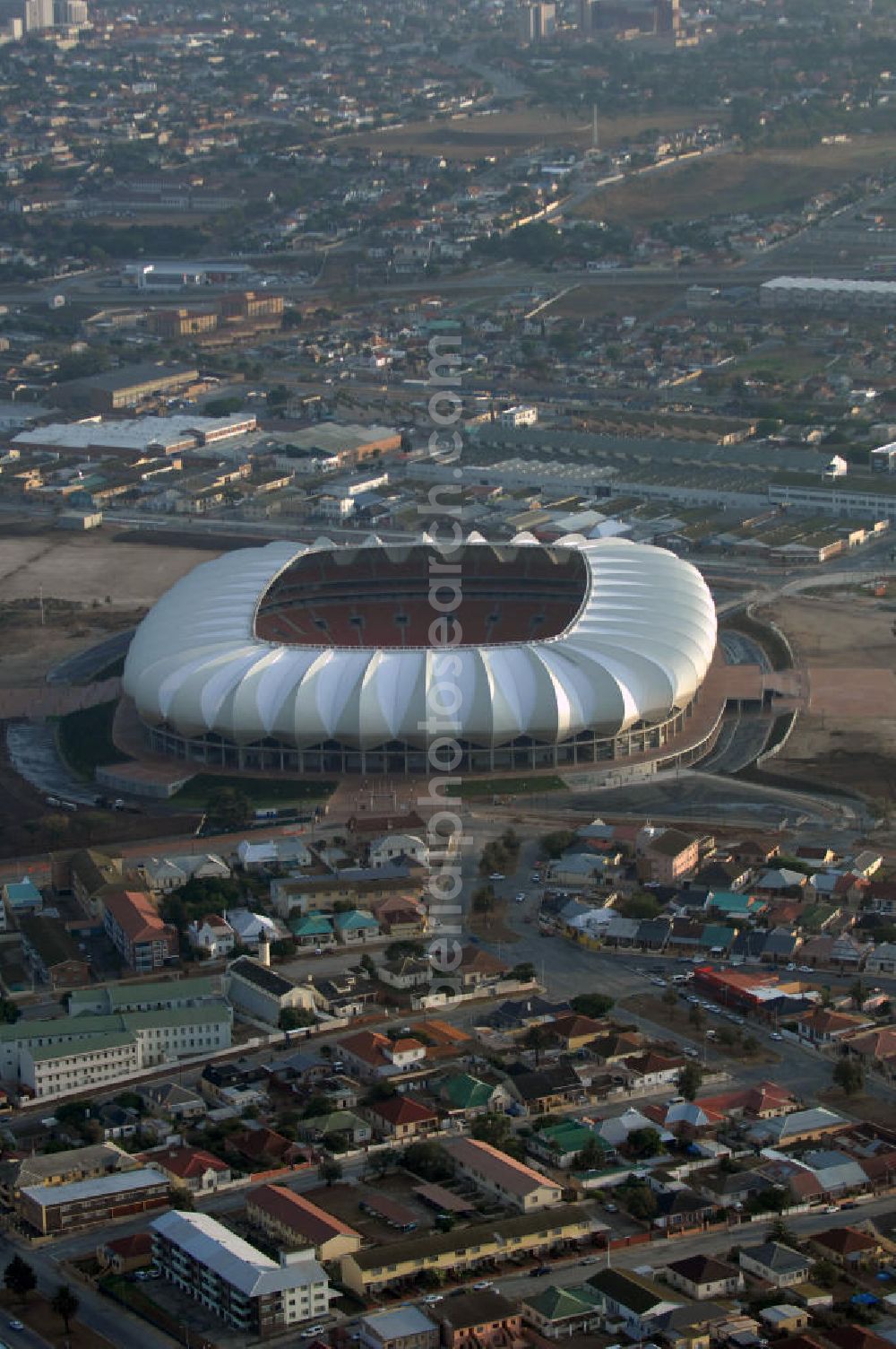 Aerial photograph Port Elizabeth - Blick auf das Nelson - Mandela - Bay - Stadion in Port Elizabeth in der Provinz Eastern Cape in Südafrika vor der Fußball-Weltmeisterschaft 2010. Der architektonische Entwurf stammt vom deutschen Architekturbüro Gerkan, Marg und Partner (gmp), die Tragwerksplanung für das Dach erfolgt durch Ingenieurbüro Schlaich, Bergermann und Partner. Das Stadion steht am North End Lake. View of the Nelson-Mandela-Bay-Stadium in Port Elizabeth in South Af?????????????????????????????????