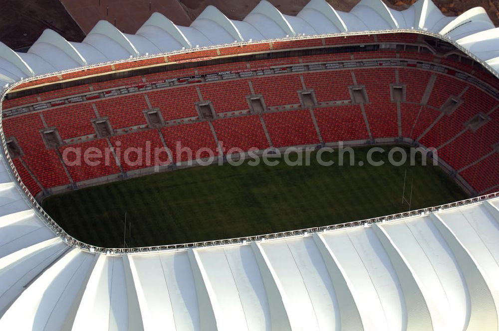 Aerial photograph Port Elizabeth - Blick auf das Nelson - Mandela - Bay - Stadion in Port Elizabeth in der Provinz Eastern Cape in Südafrika vor der Fußball-Weltmeisterschaft 2010. Der architektonische Entwurf stammt vom deutschen Architekturbüro Gerkan, Marg und Partner (gmp), die Tragwerksplanung für das Dach erfolgt durch Ingenieurbüro Schlaich, Bergermann und Partner. Das Stadion steht am North End Lake. View of the Nelson-Mandela-Bay-Stadium in Port Elizabeth in South Af?????????????????????????????????