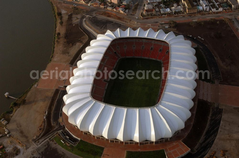 Port Elizabeth from the bird's eye view: Blick auf das Nelson - Mandela - Bay - Stadion in Port Elizabeth in der Provinz Eastern Cape in Südafrika vor der Fußball-Weltmeisterschaft 2010. Der architektonische Entwurf stammt vom deutschen Architekturbüro Gerkan, Marg und Partner (gmp), die Tragwerksplanung für das Dach erfolgt durch Ingenieurbüro Schlaich, Bergermann und Partner. Das Stadion steht am North End Lake. View of the Nelson-Mandela-Bay-Stadium in Port Elizabeth in South Af?????????????????????????????????