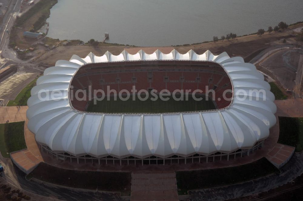 Aerial image Port Elizabeth - Blick auf das Nelson - Mandela - Bay - Stadion in Port Elizabeth in der Provinz Eastern Cape in Südafrika vor der Fußball-Weltmeisterschaft 2010. Der architektonische Entwurf stammt vom deutschen Architekturbüro Gerkan, Marg und Partner (gmp), die Tragwerksplanung für das Dach erfolgt durch Ingenieurbüro Schlaich, Bergermann und Partner. Das Stadion steht am North End Lake. View of the Nelson-Mandela-Bay-Stadium in Port Elizabeth in South Af?????????????????????????????????