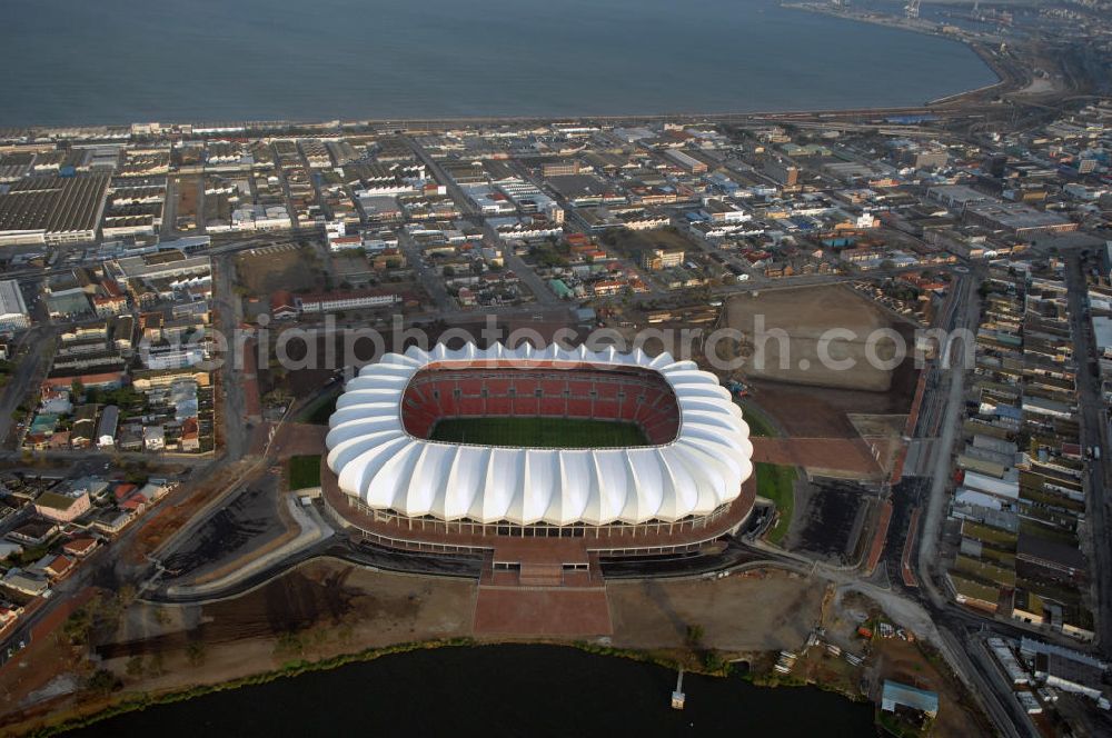 Aerial image Port Elizabeth - Blick auf das Nelson - Mandela - Bay - Stadion in Port Elizabeth in der Provinz Eastern Cape in Südafrika vor der Fußball-Weltmeisterschaft 2010. Der architektonische Entwurf stammt vom deutschen Architekturbüro Gerkan, Marg und Partner (gmp), die Tragwerksplanung für das Dach erfolgt durch Ingenieurbüro Schlaich, Bergermann und Partner. Das Stadion steht am North End Lake. View of the Nelson-Mandela-Bay-Stadium in Port Elizabeth in South Af?????????????????????????????????