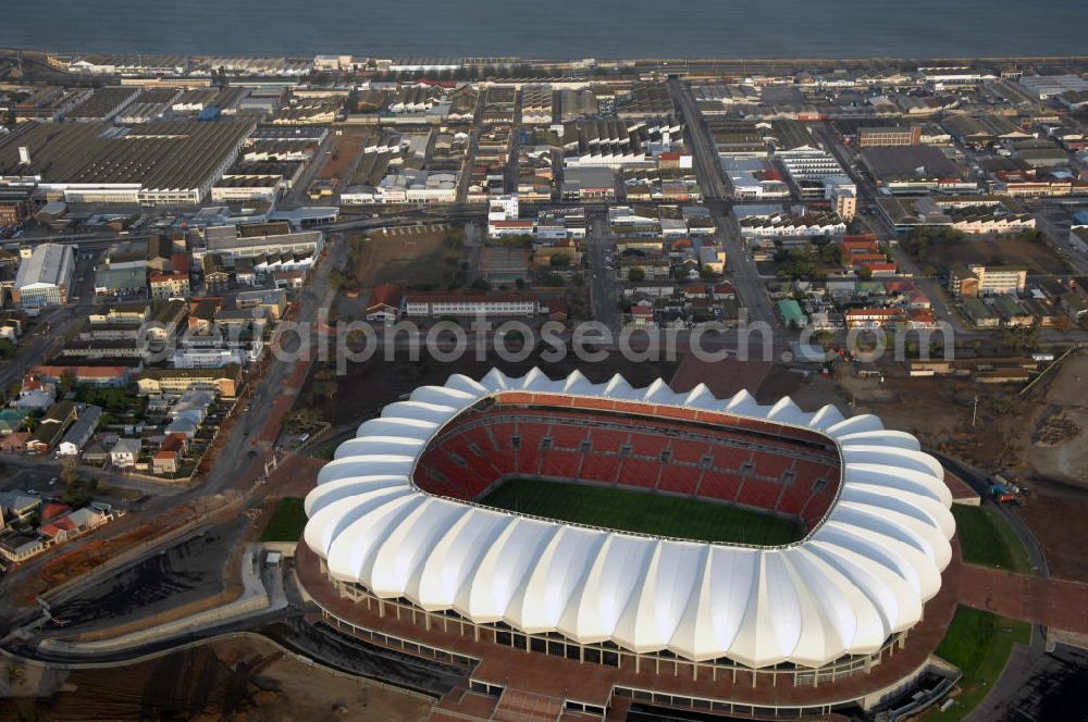 Aerial photograph Port Elizabeth - Blick auf das Nelson - Mandela - Bay - Stadion in Port Elizabeth in der Provinz Eastern Cape in Südafrika vor der Fußball-Weltmeisterschaft 2010. Der architektonische Entwurf stammt vom deutschen Architekturbüro Gerkan, Marg und Partner (gmp), die Tragwerksplanung für das Dach erfolgt durch Ingenieurbüro Schlaich, Bergermann und Partner. Das Stadion steht am North End Lake. View of the Nelson-Mandela-Bay-Stadium in Port Elizabeth in South Af?????????????????????????????????