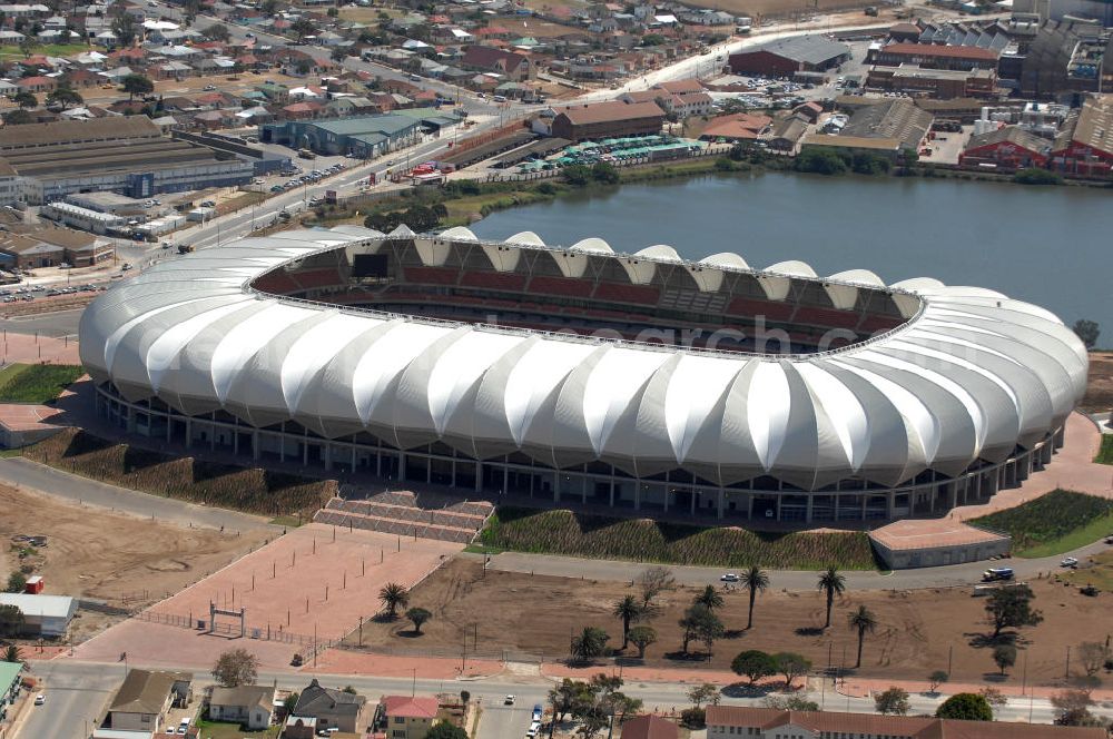 Port Elizabeth from the bird's eye view: Blick auf das Nelson - Mandela - Bay - Stadion in Port Elizabeth in der Provinz Eastern Cape in Südafrika vor der Fußball-Weltmeisterschaft 2010. Der architektonische Entwurf stammt vom deutschen Architekturbüro Gerkan, Marg und Partner (gmp), die Tragwerksplanung für das Dach erfolgt durch Ingenieurbüro Schlaich, Bergermann und Partner. Das Stadion steht am North End Lake. View of the Nelson-Mandela-Bay-Stadium in Port Elizabeth in South Af?????????????????????????????????