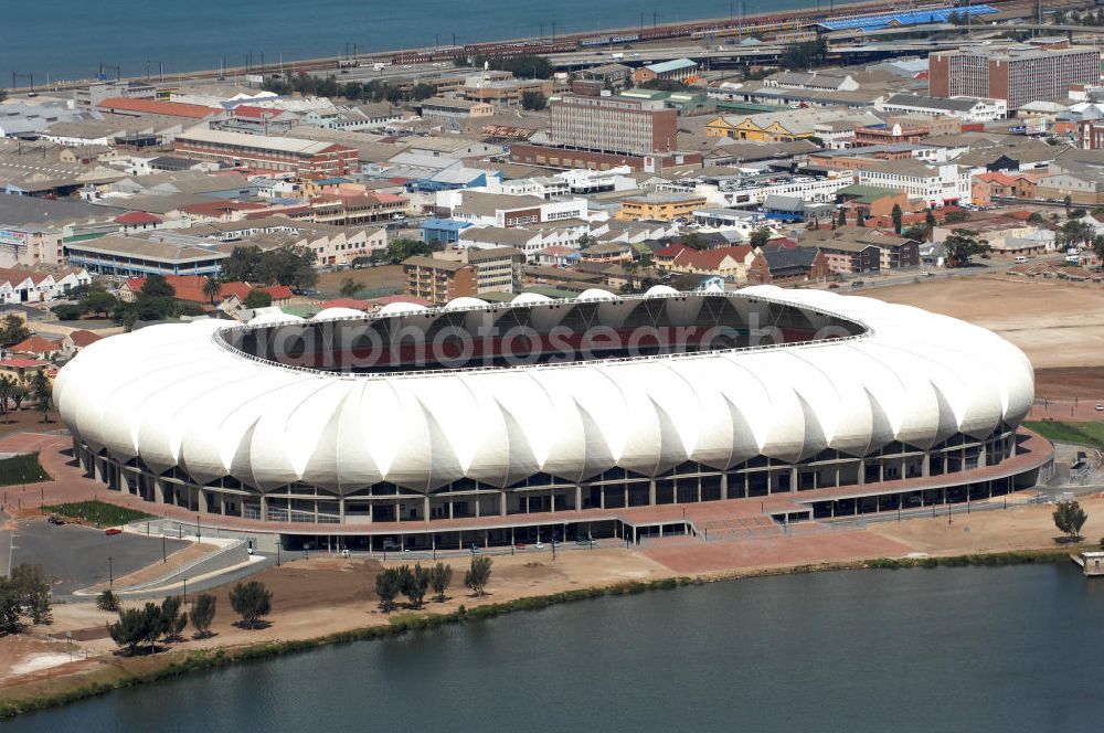 Aerial photograph Port Elizabeth - Blick auf das Nelson - Mandela - Bay - Stadion in Port Elizabeth in der Provinz Eastern Cape in Südafrika vor der Fußball-Weltmeisterschaft 2010. Der architektonische Entwurf stammt vom deutschen Architekturbüro Gerkan, Marg und Partner (gmp), die Tragwerksplanung für das Dach erfolgt durch Ingenieurbüro Schlaich, Bergermann und Partner. Das Stadion steht am North End Lake. View of the Nelson-Mandela-Bay-Stadium in Port Elizabeth in South Af?????????????????????????????????