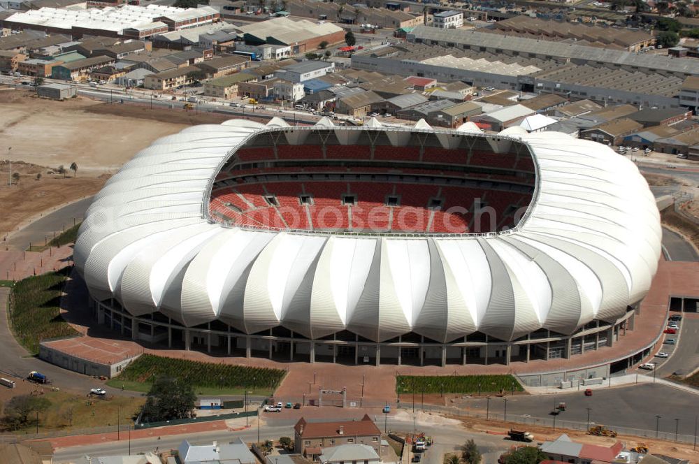 Port Elizabeth from the bird's eye view: Blick auf das Nelson - Mandela - Bay - Stadion in Port Elizabeth in der Provinz Eastern Cape in Südafrika vor der Fußball-Weltmeisterschaft 2010. Der architektonische Entwurf stammt vom deutschen Architekturbüro Gerkan, Marg und Partner (gmp), die Tragwerksplanung für das Dach erfolgt durch Ingenieurbüro Schlaich, Bergermann und Partner. Das Stadion steht am North End Lake. View of the Nelson-Mandela-Bay-St????????????????????????????????????????????????????????????????????