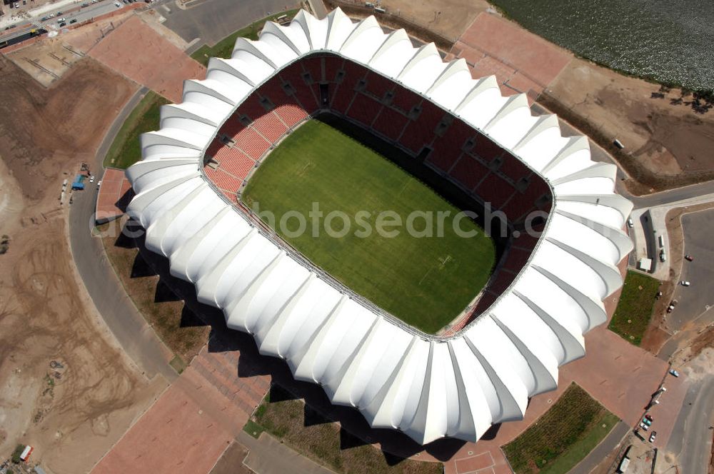 Aerial image Port Elizabeth - Blick auf das Nelson - Mandela - Bay - Stadion in Port Elizabeth in der Provinz Eastern Cape in Südafrika vor der Fußball-Weltmeisterschaft 2010. Der architektonische Entwurf stammt vom deutschen Architekturbüro Gerkan, Marg und Partner (gmp), die Tragwerksplanung für das Dach erfolgt durch Ingenieurbüro Schlaich, Bergermann und Partner. Das Stadion steht am North End Lake. View of the Nelson-Mandela-Bay-St????????????????????????????????????????????????????????????????????