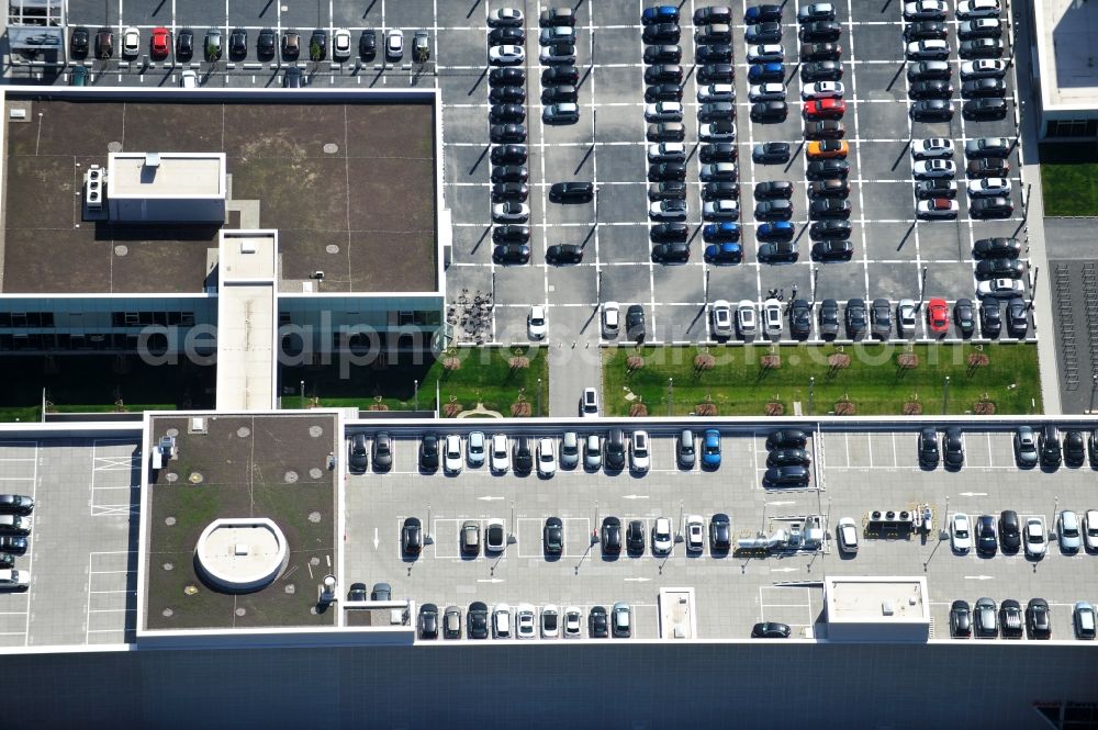 Berlin from the bird's eye view: Feriger Neubau des Audi Zentrums in Berlin - Adlershof. Die Audi Retail GmbH investiert über 30 Mio Euro um den Standort zu einem der größten Audi- Zentren in Deutschland auszubauen. Die Baufirma ZÜBLIN errichtete das Flaggschiff der 18 deutschen Audi Terminals. New building of the Audi Terminal in Berlin - Adlershof.