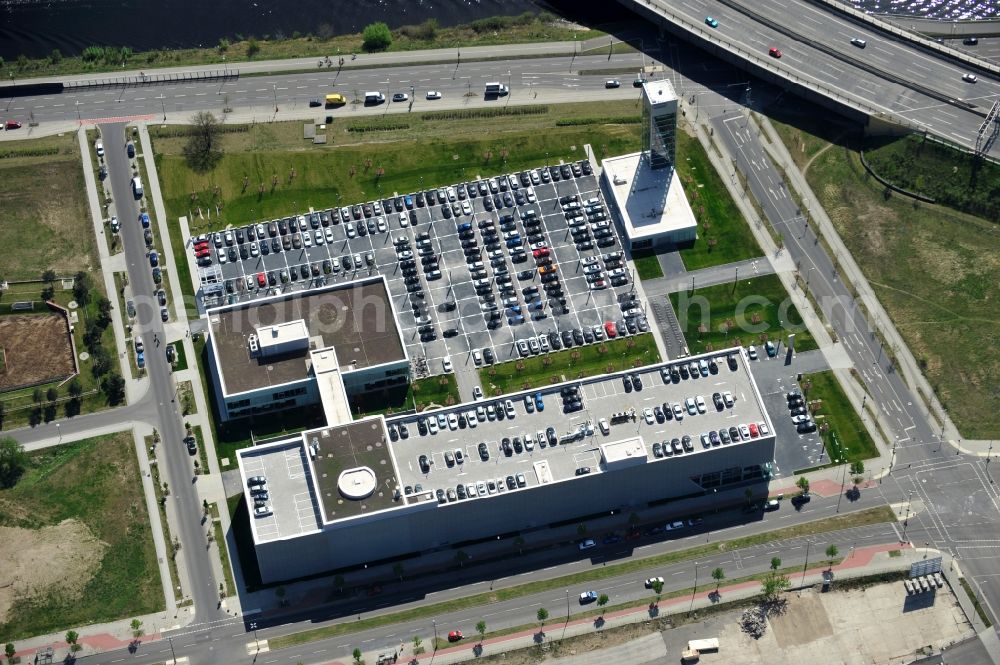 Aerial image Berlin - Feriger Neubau des Audi Zentrums in Berlin - Adlershof. Die Audi Retail GmbH investiert über 30 Mio Euro um den Standort zu einem der größten Audi- Zentren in Deutschland auszubauen. Die Baufirma ZÜBLIN errichtete das Flaggschiff der 18 deutschen Audi Terminals. New building of the Audi Terminal in Berlin - Adlershof.