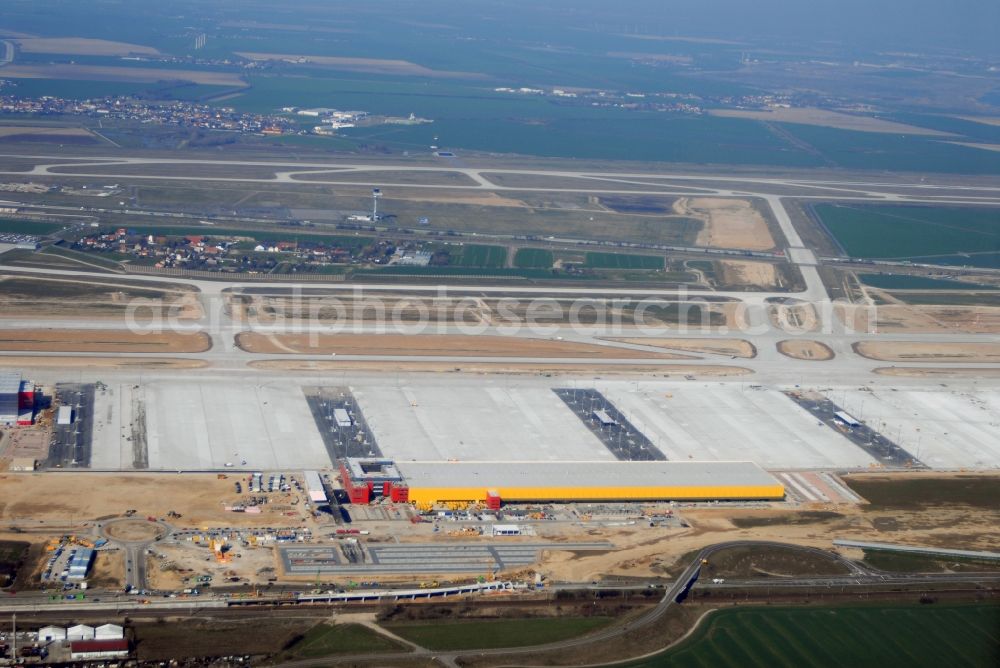 Schkeuditz from the bird's eye view: Construction site Check-in buildings and cargo terminals on the grounds of the airport on DHL Hub in Schkeuditz in the state Saxony, Germany