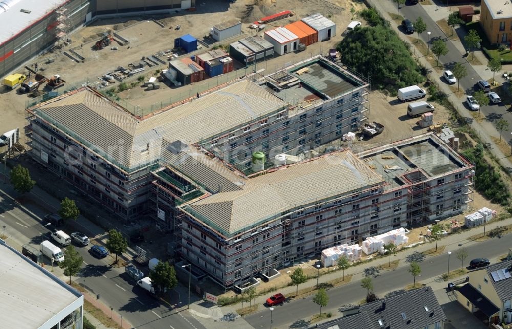 Berlin from above - Building the retirement home on Apollofalteralle in the Biesdorf park of the district of Marzahn-Hellersdorf in Berlin in Germany. The construction site is located in the development area of Biesdorf-Sued. The project is run by Deisen Bau and was designed by Milkoweit Architekten Cohrs Plaasch GbR