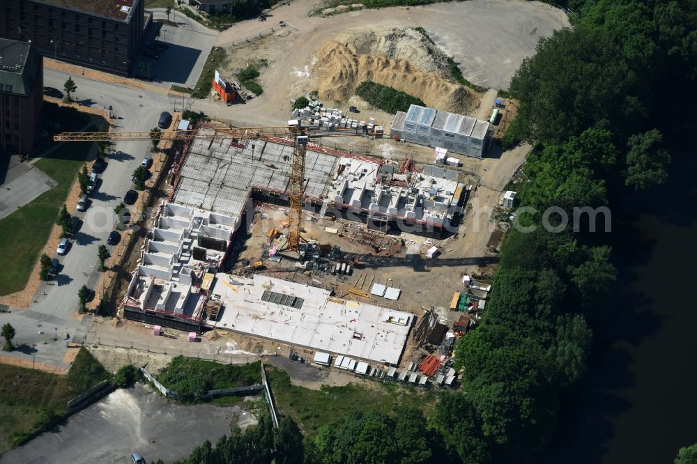 Lübeck from the bird's eye view: Construction of a nursing home - Senior residence at the Werft street in Luebeck in Schleswig-Holstein