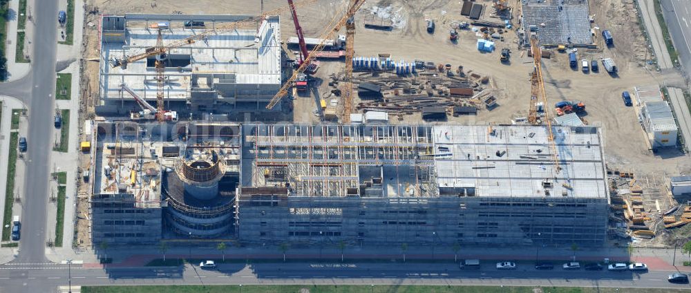 Aerial photograph Berlin-Adlershof - Neubau des Audi Terminal in Berlin - Adlershof. Die Audi Retail GmbH investiert über 30 Mio Euro, um den Standort zu einem der größten Audi- Zentren in Deutschland auszubauen. Auf über 20.000 Quadratmetern wird ab 2012 der Handelsbetrieb beginnen. Die Baufirma ZÜBLIN errichtet das künftige Flaggschiff der 18 deutschen Audi Terminals. Construction of the Audi Terminal in Berlin - Adlershof.