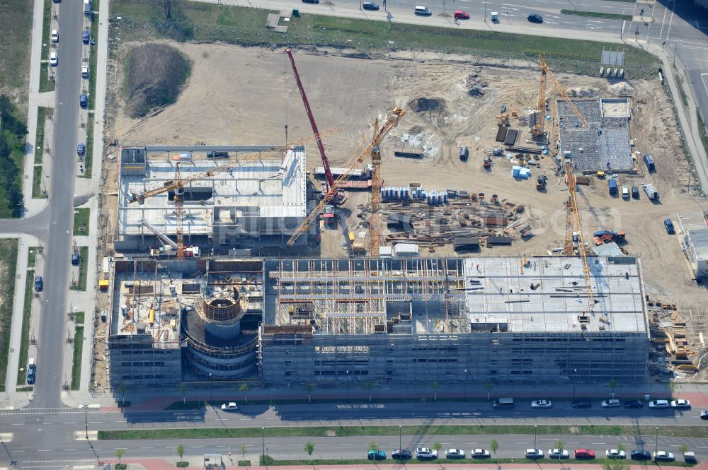 Berlin-Adlershof from above - Neubau des Audi Terminal in Berlin - Adlershof. Die Audi Retail GmbH investiert über 30 Mio Euro, um den Standort zu einem der größten Audi- Zentren in Deutschland auszubauen. Auf über 20.000 Quadratmetern wird ab 2012 der Handelsbetrieb beginnen. Die Baufirma ZÜBLIN errichtet das künftige Flaggschiff der 18 deutschen Audi Terminals. Construction of the Audi Terminal in Berlin - Adlershof.